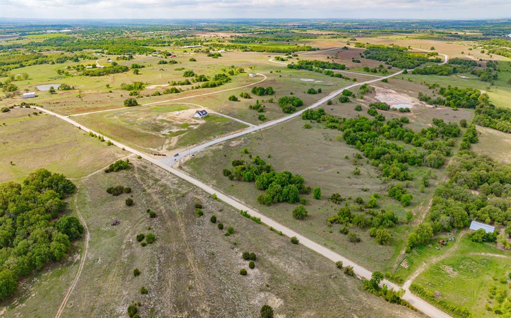 Texan Ranch West is a new 388+ acre subdivision in Stephenville, Texas! Country living at its finest! Tract 6 has a shop with electric, RV hookup and a well already in place! Enjoy secluded lots, on an established road! No HOAs, mature hardwoods, scattered ponds and more! Beautiful homesites ranging from 10-23+ acres. Escape the fast-paced city, enjoy the wide-open fresh air of country life. Take in the breathtaking views and enjoy the famous Texas sunsets. Texan Ranch West offers endless views, calming ponds, and natural rolling landscapes, which makes it the ideal community to raise your family. Build your new dream home in one of the most sought-after new land developments around. Choose your builder and build when you are ready. Come find your ideal property located in the spectacular Texan Ranch West Estate and start living your country dreams today! Let your family roots start here! Tranquility and peace at its finest, yet just 5 short minutes away from the City of Stephenville! Minimal restrictions. The photos represent Texan Ranch West as a whole property.