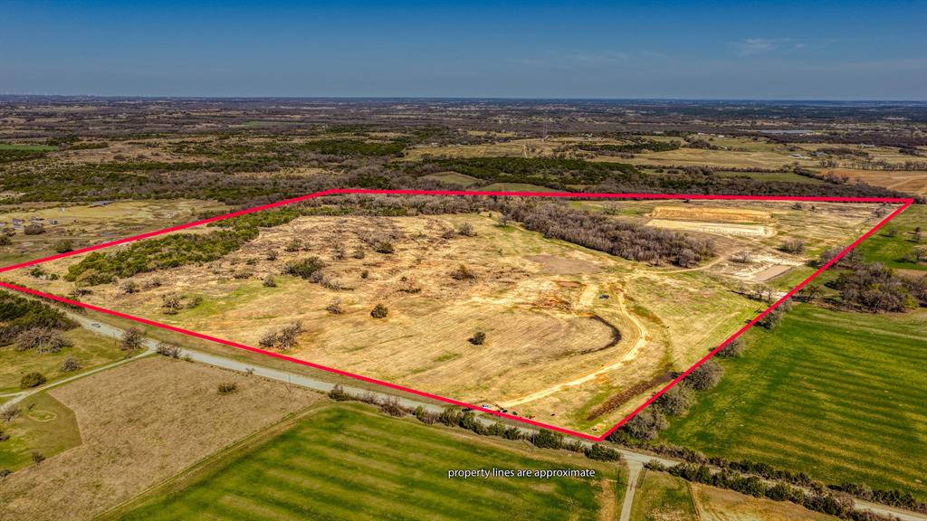 ****SELLER WILL SUBDIVIDE!****
You can't beat this location! Just 5 minutes from the Stephenville city limits, this beautiful 113-acre ranch offers the best of both worlds: quiet country living with town just around the corner.

The property features rolling hills dotted with mature oak and pecan trees, creating a classic Texas landscape. A top-notch home site sits ready for you on a high knoll, offering incredible views that stretch for miles. The entire ranch is made up of excellent, fertile sandy loam soil that has been well-managed with annual pre-emergent weed control, making the pastures incredibly productive.

This place is set up and ready to go for a serious cattle or horse operation, comfortably supporting up to 60 cow calf pairs. The fencing is in great shape, with three sides being brand new, and it's cross-fenced for easy pasture rotation. For water, you have a new 3-acre tank and a large wet weather creek. The ranch is also loaded with deer and turkey, making it a true haven for wildlife.

The heavy lifting for your facilities is already done, with a very 180'x310' barn pad and a 250' x 310' all-clay arena pad in place. 

One of the most unique features is a separate 15-acre area with significant road frontage on CR 179. This spot is perfect for developing rental homes, a commercial roping arena, or business offices without impacting the privacy and views of the main homesite. Three-phase power is available at the road.

With its amazing location, productive land, and unique potential, this is a special property that offers so much. Come see for yourself what makes this ranch the perfect place to call home.