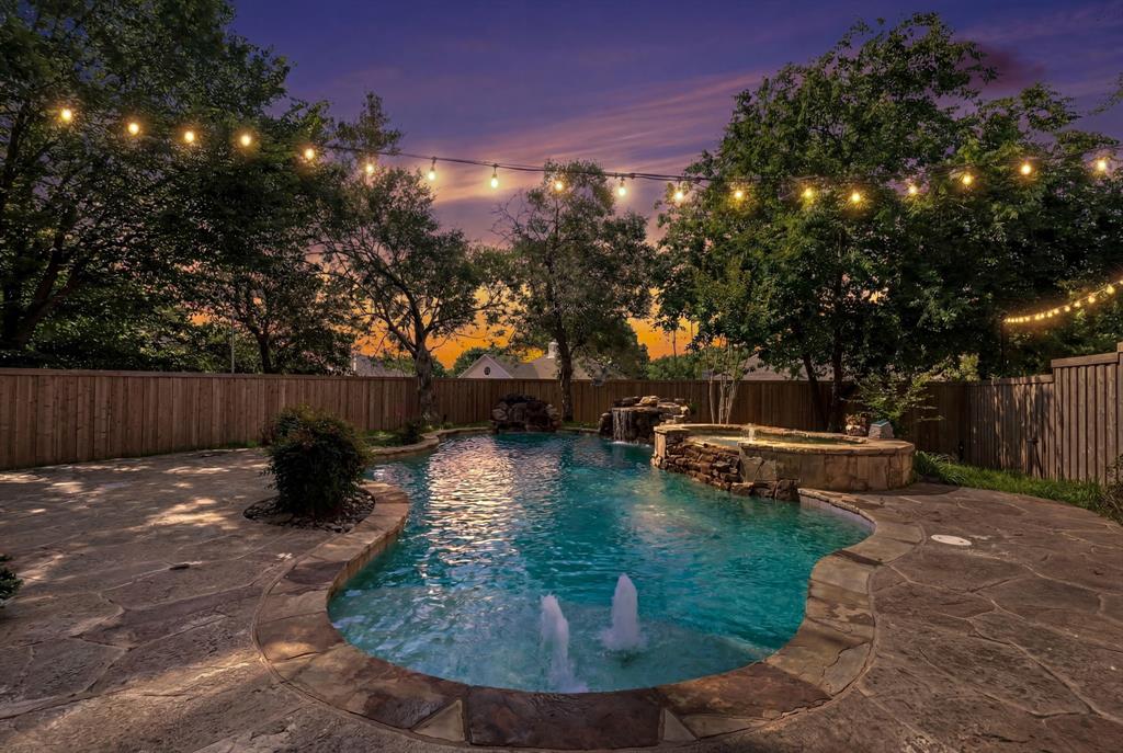 Discover refined living in this beautifully updated McKinney residence, where timeless style, thoughtful upgrades, and exceptional entertaining spaces create a truly elevated living experience. Perfectly positioned with convenient access to Hwy 75 and 121, this impressive home offers both luxury and everyday convenience near premier shopping, dining, and entertainment.

Inside, sophisticated finishes and fresh designer-inspired paint create a bright, inviting atmosphere throughout the home. Updated downstairs flooring adds warmth and elegance to the main living spaces, while expansive windows fill the home with natural light. Significant recent improvements, including new AC units, new windows throughout, and a new fence, provide both comfort and peace of mind.

Designed with both relaxation and entertaining in mind, the spacious floor plan features beautifully appointed living areas, an oversized game room, and a dedicated media room perfect for hosting unforgettable movie nights or game-day gatherings.

Step outside to your own private outdoor retreat featuring a stunning diving pool with a built-in hot tub, offering the perfect setting for resort-style living and year-round enjoyment. The garage is equally impressive with custom built-in shelving that delivers exceptional organization and functionality.

Blending modern updates, elegant design, and outstanding indoor-outdoor living, this remarkable home offers a rare opportunity to experience comfort, sophistication, and convenience in one of McKinney’s most desirable locations.