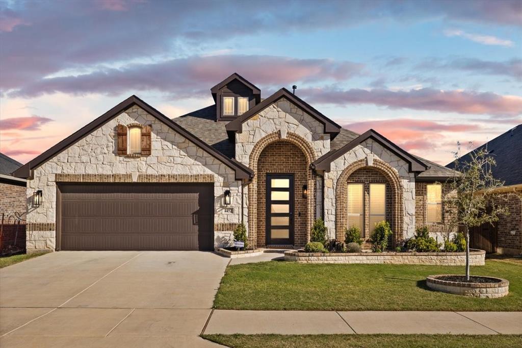 You will Fall in Love with this 4 Bedroom, 3 Full Bathroom Home known as the Hawthorne II. What makes it special is the open Living-Dining-Kitchen Area, 3 Split Bedrooms + 2 Full Bathrooms downstairs AND a true Study-Office upon entry. Wait...there's more: Upstairs is a spacious Game room and the perfect set up for guests or kid zone featuring a bedroom and FULL bathroom. Bloomfield is known for custom touches such as the Austin Stone facade accenting this Multi Peak Elevation-stunning curb appeal. The 5 panel frosted glass front door adds to the already naturally Lit interior. Custom choices in materials continue into the kitchen:Shaker Style Maple Cabinets (under cab lighting), Granite counters, 4-Burner Gas range, SS Appliances and a bonus Butler area with more storage. Tons of prep space and a HUGE WALK IN PANTRY. The Austin Stone Gas Fireplace adds coziness & warmth to the spacious family room. Primary Bedroom from a TEXAS point of view describes just how expansive this room is. Spa like Primary bathroom features dual sinks, garden tub and separate seamless glass shower with seat. Back covered porch large enough for seating is a perfect spot to enjoy the fenced in private yard. Community offers a POOL & Clubhouse, Parks, & Walking-Biking trails.  Prime Location just 6 Min from the Chisholm Trail Tollway and 20 Min from DWNTWN FT Worth. Tons of new restaurants and shopping nearby to enjoy. Do Not Miss Virtual Tour.