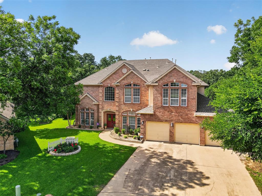 Welcome to this exceptional 5-bedroom, 4.5-bathroom home in the highly desirable Mansfield ISD. Designed with both everyday living and entertaining in mind, this spacious residence offers three living areas and two dining areas, providing ample room for gathering, working, and relaxing. The thoughtfully designed floor plan features generous bedroom sizes, multiple flexible living spaces, including an upstairs living space or game room, and abundant natural light  with floor to ceiling windows throughout. The well-appointed kitchen opens to the main living areas, creating a seamless flow for hosting family and friends. Step outside to your private backyard retreat on a spacious 1.53 acres, featuring a fire pit, pergola and sparkling swimming pool, with Pebbletec, perfect for enjoying Texas summers.  This one of a kind lot boasts a dense post oak tree-line on the property that is part of the historic Cross Timbers Consortium.  The property has the privacy and feel of country living with the luxury and convenience of the city.  A luxury epoxy floored 3-car garage provides plenty of parking and storage space. This property also comes equipped with a Generac 24 KW full house generator that will ensure you are never without power. This home is conveniently located near shopping, dining, parks, and major highways, this home offers the perfect combination of space, comfort, and location with one of a kind lot.