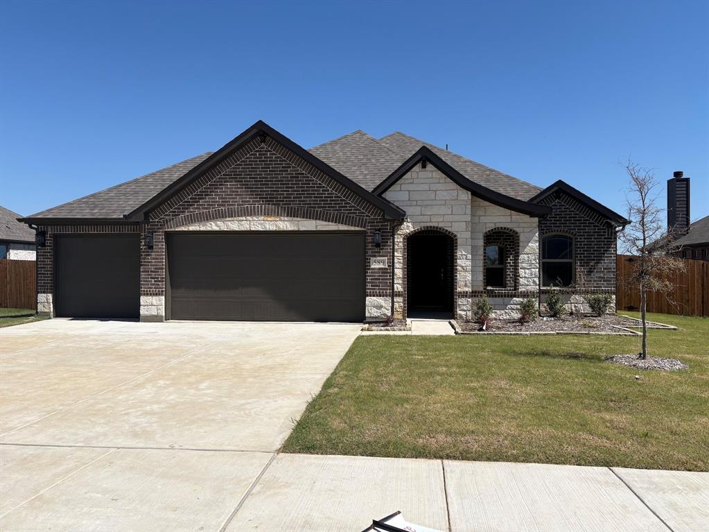 Charming 3-bedroom, 2-bath home on a spacious 3RD-acre lot featuring a rare 3-car garage. This 1,741 sq. ft. home offers an open layout with granite countertops, double ovens, and a stunning stone-to-mantle fireplace. Enjoy the perfect blend of functionality and style with plenty of room to spread out, inside and out.