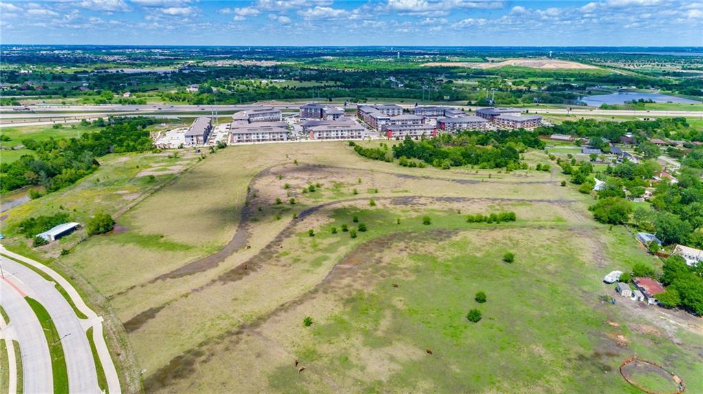 Prime Property along the South Side of PGBT with high traffic and visibility. Only  Fabulous opportunity for development on 4.5 plus acres in one of the fastest growing areas near major freeways. This property is ideal for a number of business opportunities such as retail, private schools, etc. and is located in the city limits and near Firewheel. Ideally located for your next development!