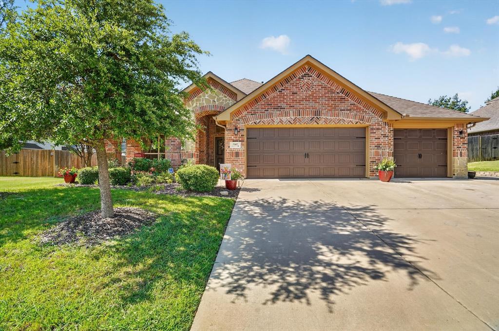 Welcome to this well-designed 3-bedroom, 2-bath home in the Hills of Lake Country, offering over 2,050 square feet of flexible living and standout outdoor features. From the moment you arrive, the covered front patio and inviting curb appeal set the tone, perfect for slow mornings with coffee or winding down in the evening.

Inside, the layout offers versatility right away with a front flex space that can serve as a formal dining area, second living room, or home office. The kitchen sits at the heart of the home with generous storage and connects easily to the dining area, complete with a built-in desk for everyday functionality. Toward the back, the main living room with a cozy fireplace creates a comfortable space to gather, while the split-bedroom layout provides privacy, with the primary suite tucked away and featuring a large walk-in closet.

Step outside and the lifestyle really opens up, an extended pergola-covered patio leads directly to a saltwater pool, creating a true backyard retreat. A storage shed and gated boat or trailer parking add even more practicality, along with a three-car garage.

Located near Eagle Mountain Lake, residents have the option to join the Lake Country Property Owners Association for access to a private boat ramp and community events throughout the year, from summer food trucks to holiday celebrations.

A home that blends everyday comfort with weekend-ready living.