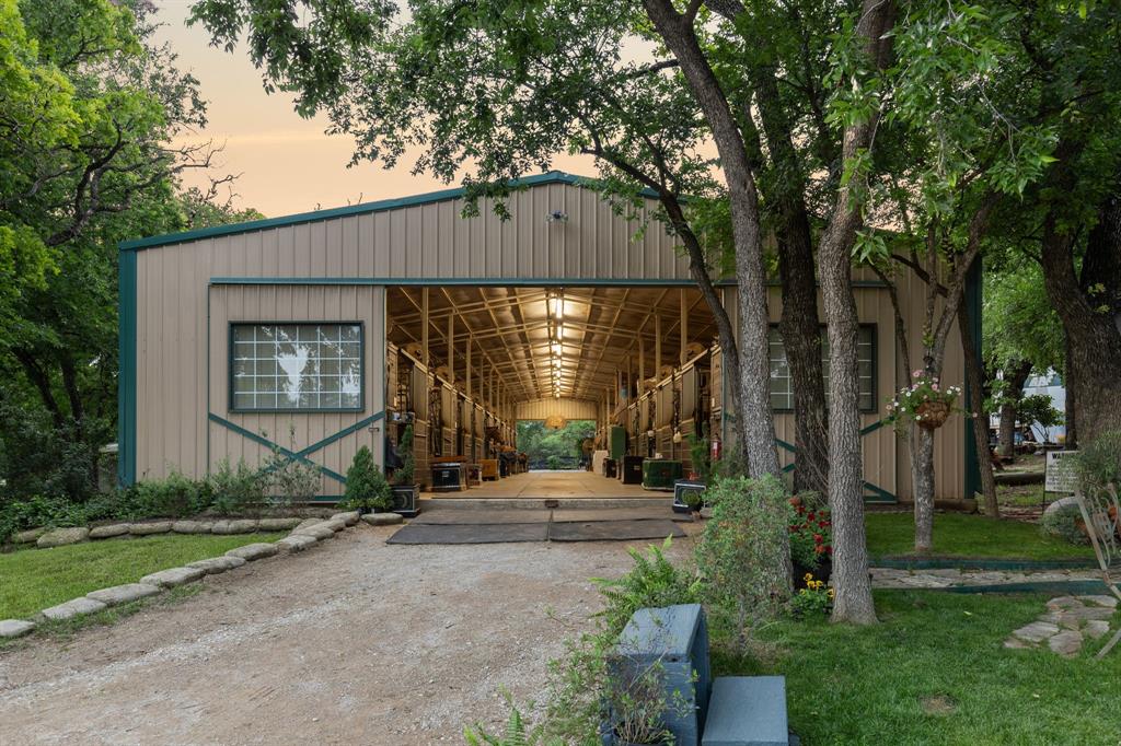 Incredible opportunity to own a gorgeous horse farm in Argyle proper! Situated on 10 wonderful grassy acres and surrounded by high end luxury homes. This property is the most picturesque in town farm! Featuring a timeless classic farmhouse, gorgeous horse barns and ranch hand living quarters. Premium riding arena and individual turn out pastures. Great cross ventilation in the barns and plenty of trees for shade. This gorgeous turn key horse farm is ready to go for horse boarding and as a personal family farm! Windswept Farm is a wonderful income producing horse property in an ideal location. A beautiful horse farm in Argyle proper with award winning Argyle schools! Multi parcel property includes 1.5 acre parcel and 8.483 acre parcel totaling 9.983 acres.