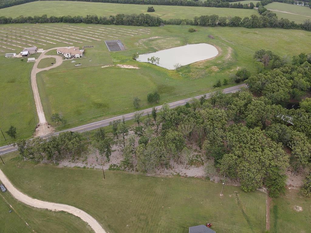 Discover this 2.7 acre residential building lot located about 10 minutes northeast of Paris, Texas. Situated in a highly desirable area, this property offers a peaceful setting with a selectively cleared landscape, preserving only mature hardwood trees that provide natural beauty and privacy. With a balance of open space and shaded surroundings, the lot offers excellent flexibility for your future build. Bring your building plans and create the custom home or private retreat you’ve been envisioning to this beautiful and well-situated tract.