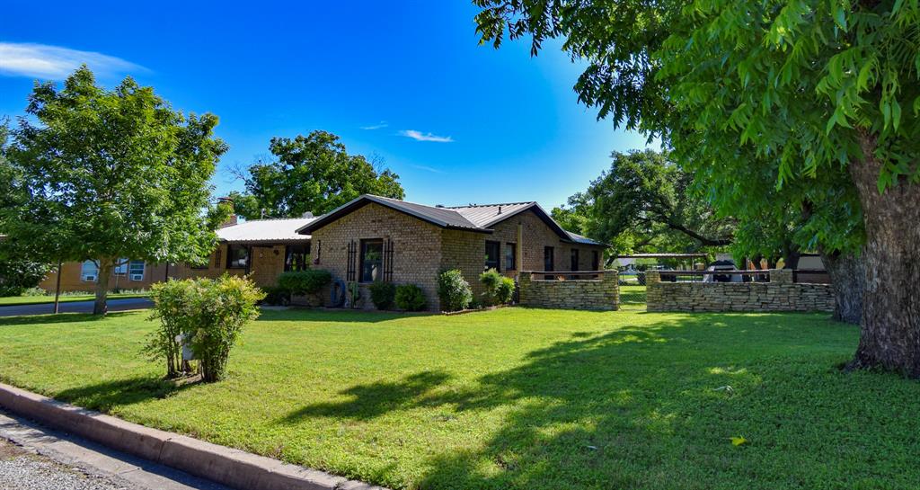 Comfortable, spacious, and easy to maintain, this well kept 3 bedroom brick home offers the perfect blend of indoor comfort and outdoor versatility on a generous .355 acre lot. Natural light fills the home while updated bathroom vanities and an oversized primary bedroom with room for king-size furniture add to the home’s inviting feel. The living room fireplace creates the perfect spot to cozy up on chilly winter nights.
One of the standout features is the impressive 1,040 sq. ft. shop, offering endless possibilities for hobbies, projects, storage, woodworking, or even a home-based business. Multiple carports and a garden shed provide even more convenience and flexibility.
Outside, the property offers a peaceful setting with mature oak trees for summer shade, producing pecan trees, and a covered patio perfect for morning coffee or evening gatherings. The backyard opens to an alley with a park just beyond, creating added privacy and an open feel.
Located in an established neighborhood near the elementary school, 2013 S. Walnut offers comfortable living, practical space, and room to enjoy both inside and out.