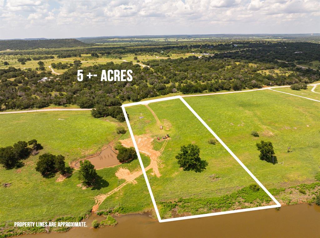 Looking for river front property, look no further! Stunning property in the Brazos Mountain Ranch, a premier gated community. Property has well installed already! Build your own cabin, barndominium, or simply enjoy your land as you see fit.  45 minutes from Possum Kingdom Lake. Palo Pinto County's new State Park features a visitor's center, playscape, pavilion, equestrian, camping, fishing and more. Membership in a cattle grazing association is mandatory to insure that the very important AG-Exemption remains for all.