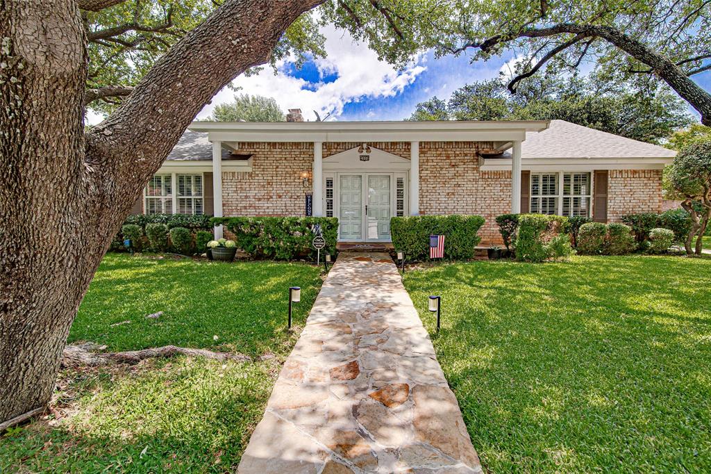 Welcome to 2900 Bedfordshire, a charming 4-bedroom, 2.5-bath home nestled in the coveted Rollingwood Subdivision of Bedford at the heart of DFW. This residence offers spacious living with the potential for a home office or additional living area in the 4th bedroom. The master suite boasts 4 closets, with two walk-ins, and all bedrooms feature ample storage. Enjoy the convenience of a Jack and Jill bathroom, induction cooktop, and double oven. Embrace outdoor living in the large enclosed flagstone patio, two story outdoor storage shed, the sprawling backyard patio, or the inviting front porch patio and swing. The property is walking distance to the redeveloped Generations Park at Boys Ranch with easy access to major highways 121, 183, 360, and 114, along with proximity to DFW Airport. With plantation shutters, a wood-burning fireplace, and ample closets and storage, this home combines practicality and comfort, making it a perfect choice for you.