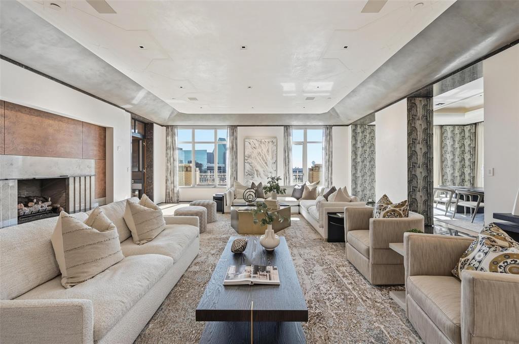 Captivating views of Dallas & exquisite details of pure luxury boasts throughout this 4 bedroom Ritz Carlton full floor Penthouse. Defined elegance, gracious living spaces, art lighting, gallery hall, marble ceilings, archways & wrap around balconies. A one of a kind Dallas address that encompasses it all with 5 star hotel amenities, including valet, room service, concierge, fitness center & full service spa; all within the heart of the city.
