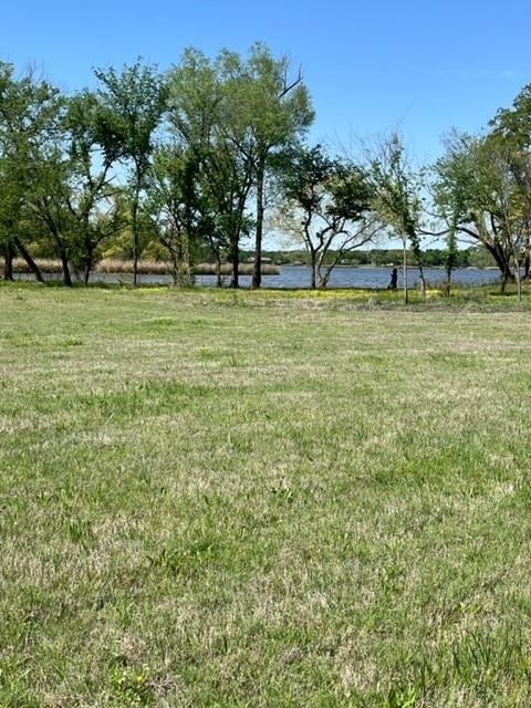17+- BEAUTIFUL ACRES WITH LAKE ALVARADO FRONTAGE.  This property has an incredible picturesque home site with a pond in the backyard that offers a park like setting with large pecan trees and a wonderful view and access to the lake. A seasonal creek is the western border and CR 405 the southern border.  Build your house, bring your animals and enjoy a little slice of heaven in the country.  This property will be subdivided from a larger parcel, proposed boundary lines attached. All 29 acres plus house are available.  Approximately 13 acres completely fenced, utilities available from CR 405.  Property is Ag Exempt.  New survey will be needed.