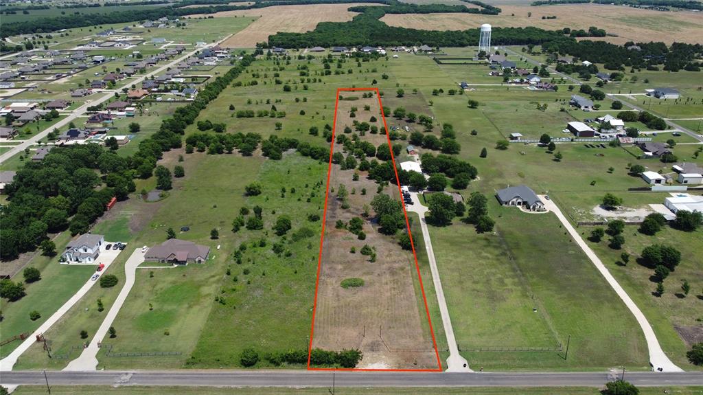 Discover the perfect blend of space and opportunity with this beautiful 5-acre tract in Waxahachie, TX! Featuring a pipe fence entrance and a partially cleared landscape, this property offers an ideal setting to build your dream home, barndominium, or private retreat. Mature trees and natural surroundings provide a peaceful country atmosphere while still being conveniently located near town amenities. The land offers a great mix of open space and wooded areas, creating endless possibilities for homesites, recreation, gardening, or simply enjoying the outdoors. With plenty of room to spread out and make it your own, this property is ready for your vision to come to life!
