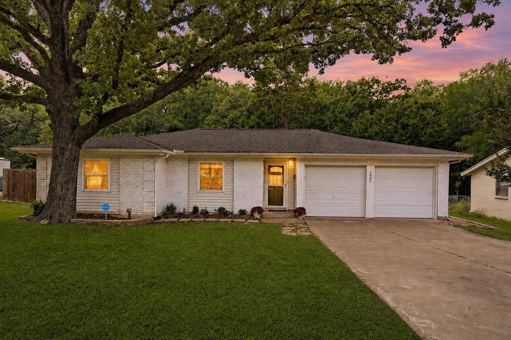 Stunning Move In Ready Home on an Oversized Private Corner Lot. Over $110K in Updates! Welcome home to this beautifully maintained gem where pride of ownership truly shines. Nestled on an oversized corner lot with a peaceful greenbelt directly behind, this property offers a rare blend of privacy & space that's hard to find. This is NOT an investor flip home.
This home has been meticulously cared for & is genuinely move in ready. Major improvements include  rehabbed plumbing, updated electrical & safety systems brought to code, beautifully updated kitchen & bathrooms, fresh paint & gorgeous wood look porcelain tile throughout which is great for easy cleaning. (full list of updates in transaction desk)
Step outside & fall in love with the massive backyard retreat, designed for relaxation & functionality. Enjoy quiet mornings or evening gatherings beneath the metal gazebo, surrounded by mature tree privacy. The oversized lot & greenbelt backdrop create a tranquil setting that is tucked away from the hustle and bustle. A standout feature is the large electricity powered shed, opening the door to endless possibilities. Add a window unit or mini split & transform it into a workshop, hobby space, studio, home office or the ultimate she shed. Location is equally impressive. Enjoy close proximity to a highly rated elementary school, Glade Parks shopping & dining, Bob Eden Park, DFW Airport &  the convenience of the new HEB just minutes away. Say hello to low electric bills! Batteryless Solar already installed (no need to ever replace the battery!) & a LOW $135 a month solar assumption payment on top of LOW electric bills. Balance IS negotiable. These build credit over time, so the longer you have them, the lower the bill.
If you’ve been searching for a home that has privacy, oversized outdoor living, quality updates & true pride of ownership at a great price, this one is absolutely stunning & deserves a spot at the top of your list.
Grass Virtually Greened