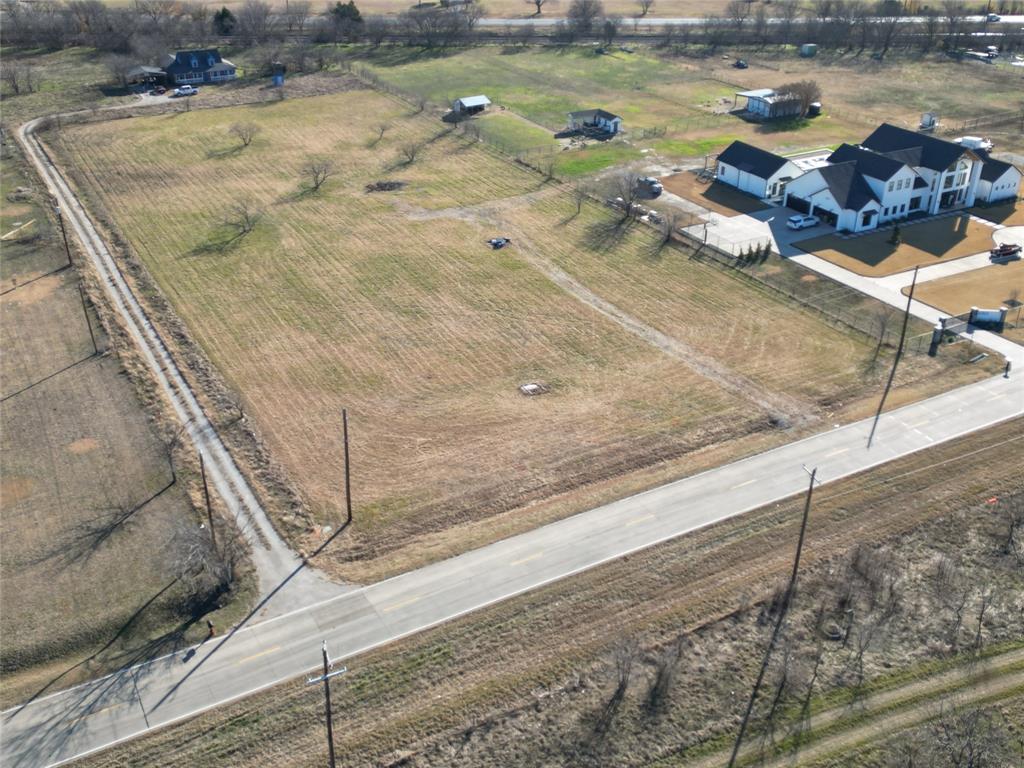 MOTIVATED SELLER - Ready to review all offers. Rare 1-acre homesite in Argyle ISD with utilities available and flexible builder options. Excellent access to Hwy 377, I-35E, and I-35W. Priced to sell. Surrounded by new development and quality construction, this area is quickly emerging as one of North Texas most desirable places for custom homes. NO HOA