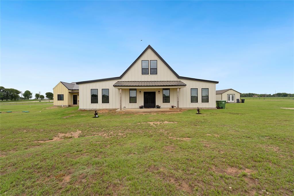 Come check out this amazing BARNDOMINIUM sitting on 3.56 acres, featuring a 774 sq ft steel-frame guest house that's fully accessible with spacious doorways and a large shower. Wonderful for multi-generational family dynamic!  The main house offers 4 bedrooms and 2 bathrooms, along with a generous walk-in pantry, a cozy 316 sq ft loft area, custom made cabinets, stunning floors and plenty of special touches throughout.  It’s built as an energy-efficient SIP home with top-notch insulation (high R-values) and airtight construction, perfect for saving on energy bills and staying comfy year round.  The roof is vented with multiple Studor Vents so the roof is 100 percent sealed.  
All the little details are handled with care: a water well drilled to 442 feet, a 1500-gallon aerobic septic system, and a slab poured in one continuous pour with a pump truck. The house sits on a raised pad on a hill with 12-16 inch beams embedded in 2.5 feet of virgin soil, reinforced with at least five eights inch rebar for extra strength.  The 'work shop' is 16 x 28 and has electricity access and light hook-ups.  
There’s a 50 amp RV Hookup and a RV dump access by the septic. 
If you're interested, you can even purchase more land, this property borders an additional 159 acres that can be bought in 10-acre sections if you'd like to expand.