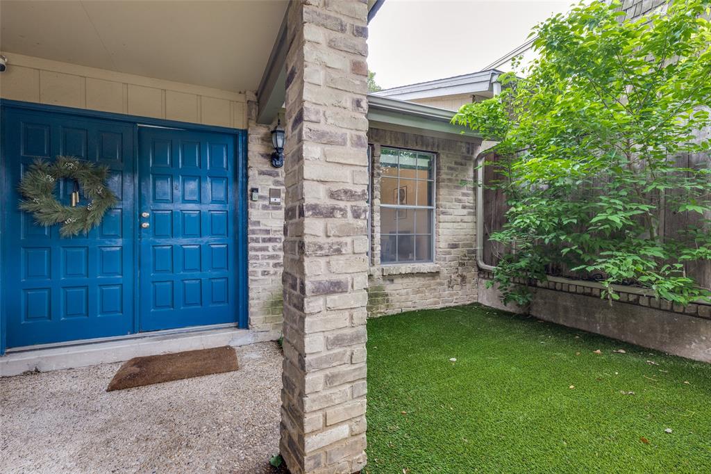 Updated townhome-style condo in an unbeatable Dallas location just minutes from NorthPark Center, Topgolf, major highways, and some of the city's best shopping, dining, and entertainment. Inside you'll find a bright and inviting open-concept floorplan with soaring vaulted ceilings, updated flooring, abundant natural light, and a cozy fireplace.

Upstairs features two generously sized bedrooms, including a spacious primary suite with an ensuite bath and ample closet space, along with a secondary bedroom served by its own full bathroom. Downstairs offers a convenient half bath, dedicated laundry area, and access to a private, fully turfed backyard that is perfect for pets, entertaining, or low-maintenance outdoor living.

One of the standout features of this home is the attached two-car garage, providing secure parking, additional storage, and direct access into the unit. Unlike many condos in the area, this community also offers abundant guest parking just steps from the front door, making everyday convenience and entertaining a breeze.

Adding even more value, the refrigerator, washer, dryer, and all existing window treatments will convey with the sale, making this a truly move-in ready opportunity from day one.

Nestled within a gated community surrounded by mature trees, green space, and walking areas, residents enjoy both privacy and peace of mind. The HOA covers water, sewer, and trash, helping simplify monthly expenses and ownership costs.

Whether you're looking for a primary residence or an investment property, this well-maintained unit offers excellent rental potential thanks to its desirable location, functional floorplan, low-maintenance lifestyle, and proximity to Dallas' major employment, retail, and entertainment hubs. Easy, lock-and-leave living in a prime location with the parking, amenities, and convenience.