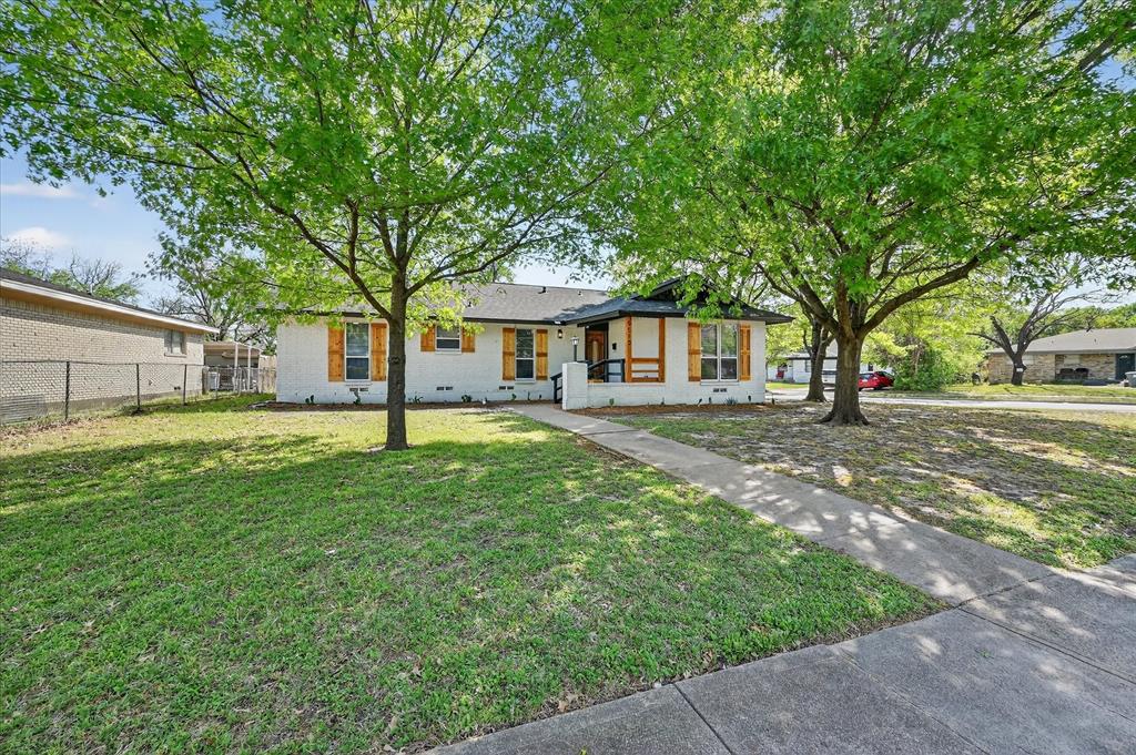 Completely renovated from top to bottom, this stunning home blends modern upgrades with thoughtful design and timeless style. Every detail has been carefully updated, offering peace of mind and move-in ready convenience. The home features a brand-new dual black roof with 30-year shingles installed this year, along with a professionally repaired foundation that includes a 5-year warranty. Major system updates include a new electrical panel, updated outlets and switches, all-new lighting, fixtures, and fresh interior paint throughout. Step inside to discover new vinyl flooring and baseboards flowing seamlessly through the entire home, creating a clean and cohesive look. The fully redesigned kitchen is a true showstopper, complete with new cabinetry, sleek granite countertops, floating and open shelving, and all brand-new stainless steel appliances—perfect for both everyday living and entertaining. Both bathrooms have been completely renovated with modern finishes and stylish touches. Additional upgrades include a new water heater and new garage door openers for added convenience. Unique wood accents throughout the home add warmth and character, including a beautiful barn door in the primary bedroom bathroom. Situated on an oversized corner lot, the property offers plenty of space, mature trees, and eye-catching drought-tolerant landscaping designed for easy maintenance and year-round curb appeal. Conveniently located just a short drive from Samuell High School and Pleasant Oaks Park, this home provides both comfort and accessibility. This is a rare opportunity to own a fully updated home with high-end finishes, major system improvements, and a prime lot—ready for you to enjoy from day one.