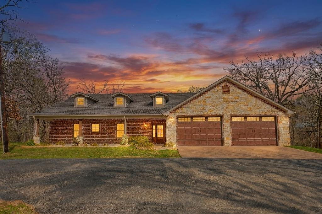 Welcome to the perfect blend of elegant finishes and timeless country charm. Situated on almost 9 beautiful acres, this stunning 3-bedroom, 2.5 bath home offers privacy, space, and refined comfort in a peaceful rural setting. From the moment you step inside, you’ll notice the abundance of large windows throughout the home, filling every room with natural light and showcasing picturesque views of the surrounding countryside. The thoughtfully designed layout creates a bright, airy atmosphere that seamlessly connects indoor living with the beauty of the outdoors. The spacious living area flows into a beautifully appointed kitchen featuring high-end finishes, quality cabinetry, stylish countertops, and modern appliances, making it perfect for both everyday living and entertaining guests. Every detail has been carefully selected to combine sophistication with warmth. The primary suite offers a private retreat with generous space and a beautifully designed bathroom built for comfort and relaxation. Two additional bedrooms provide flexibility for guests, family, or a home office, each benefiting from the home's bright, light-filled design. Step outside and experience the true beauty of country living. The expansive acreage offers endless possibilities—room for animals, gardening, recreation, or simply enjoying the quiet serenity of wide-open spaces. Whether you’re enjoying morning coffee while watching the sunrise or relaxing in the evening with scenic sunset views, the property offers a peaceful lifestyle that’s hard to find. This exceptional property offers the perfect balance of luxury, comfort, and country living—a rare opportunity to enjoy space, beauty, and tranquility all in one place.