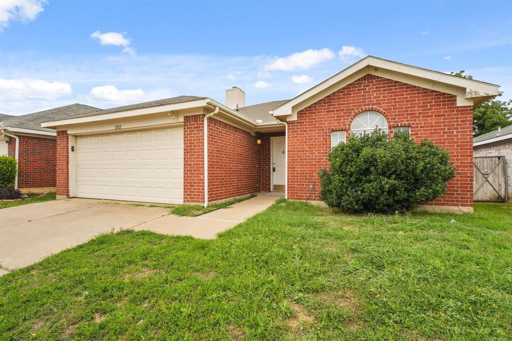 Welcome to 2312 Corral Drive in Fort Worth, a charming single-story home that offers comfort, functionality, and a convenient location within highly regarded Crowley ISD. This 3-bedroom, 2-bath residence features approximately 1,268 square feet of living space and a thoughtfully designed layout ideal for everyday living.

Step inside to find a spacious living area anchored by a wood-burning fireplace, creating a warm and inviting atmosphere for gathering with family and friends. The functional floor plan provides comfortable bedrooms, ample natural light, and a seamless flow between living and dining spaces. A two-car garage adds convenience and storage, while the generous backyard offers plenty of room for entertaining, gardening, pets, or simply enjoying the outdoors.

Located in an established neighborhood, this home provides easy access to major highways, shopping, dining, schools, and entertainment. Whether you're a first-time buyer, downsizing, or looking for an investment opportunity, 2312 Corral Drive offers a fantastic combination of location, comfort, and value in southwest Fort Worth.