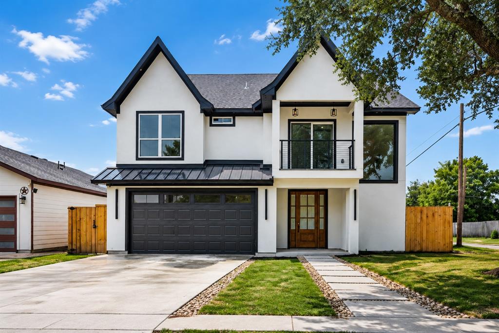 Experience modern luxury just minutes from Downtown Dallas, Bishop Arts District, Trinity Groves, and the upcoming Southern Gateway Park. This stunning new construction offers 4 bedrooms, 3.5 bathrooms, and 3,174 square feet of thoughtfully designed living space, blending striking architecture with upscale finishes and exceptional functionality.

Step inside to soaring two-story ceilings, expansive windows that flood the home with natural light, and a dramatic floor-to-ceiling fireplace that anchors the impressive living room. The open-concept layout flows seamlessly into the chef-inspired kitchen featuring an oversized quartz island, ceiling-height custom cabinetry, designer lighting, abundant storage, and a spacious walk-in pantry.

The first-floor primary suite is a private retreat, complete with a spa-inspired bathroom featuring a freestanding soaking tub, oversized walk-in shower, dual vanities, LED backlit mirrors, and a generous walk-in closet. Upstairs, you'll find three additional bedrooms, two full bathrooms, a spacious game room overlooking the living area below, and both front and rear balconies that extend your indoor-outdoor living experience.

Situated on a spacious corner lot, the oversized backyard offers endless possibilities for entertaining, relaxing, or adding a future pool. Complete with a covered patio and attached two-car garage, this home offers quick access to major highways, shopping, dining, and some of Dallas' most popular destinations, delivering the perfect blend of luxury, comfort, and convenience.