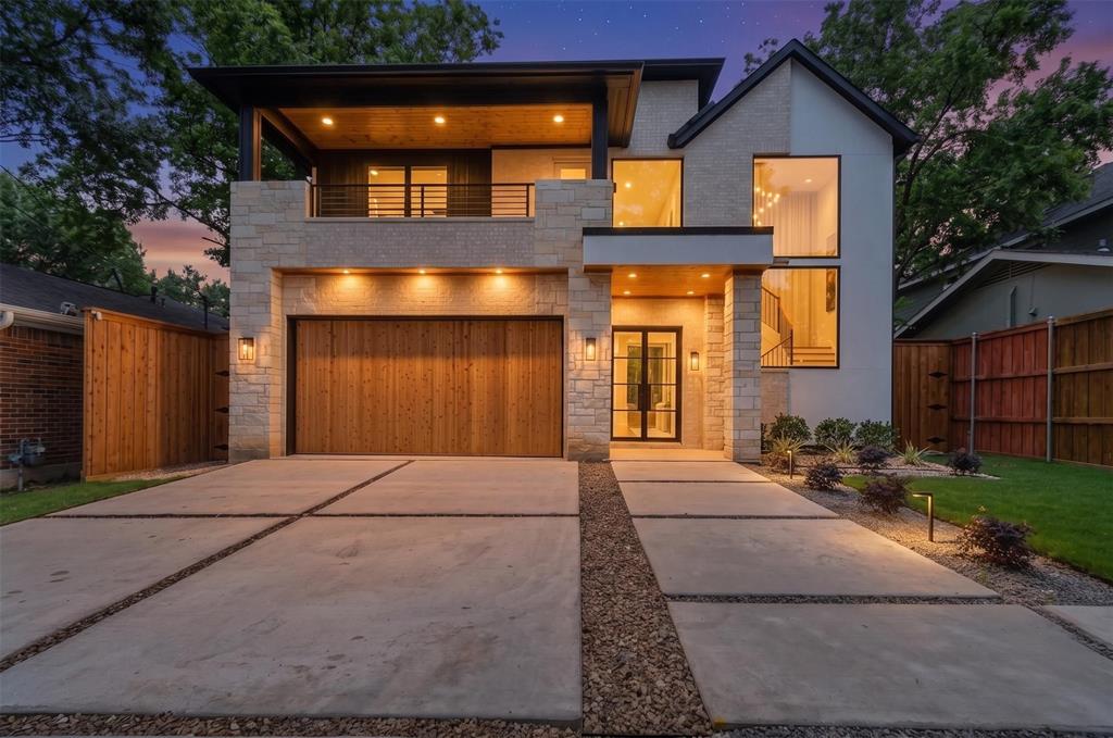 Exceptional new construction by DCI Home Builders in the heart of East Dallas’ coveted Bel-Aire Estates. This thoughtfully designed 4,298-square-foot residence offers 4 bedrooms, 6 bathrooms, a private office, media room, finished garage, and dual covered patios. A striking stone-and-stucco exterior with bronze steel-framed windows opens to a dramatic two-story great room featuring soaring ceilings, wood beams, clerestory windows, and walls of glass that fill the home with natural light. The chef’s kitchen is equipped with an oversized waterfall island, custom white oak cabinetry, premium appliances, warm brass accents, and a separate butler’s scullery. The main-level primary suite serves as a private retreat with backyard access, a spa-inspired marble bath, soaking tub, oversized walk-in shower, and custom closet. Upstairs features three additional bedrooms, a media or game room, second laundry area, and a private covered balcony overlooking mature treetops. Located just minutes from White Rock Lake, Lakewood, the Dallas Arboretum, and Casa Linda Plaza, this exceptional residence combines timeless architecture, elevated finishes, and modern luxury in one of East Dallas’ most desirable neighborhoods.