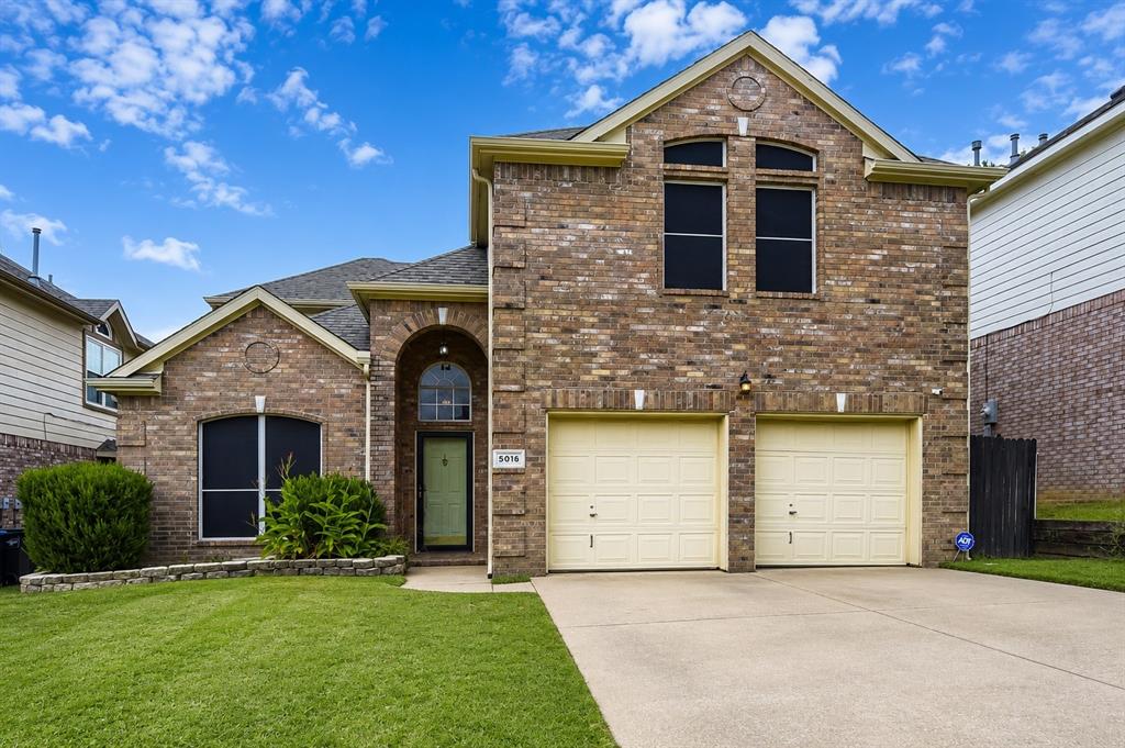 Welcome to this beautifully maintained 4-bedroom, 2.5-bath brick home offering the perfect blend of comfort, style, and functionality. From the moment you step inside, you'll appreciate the abundance of natural light that fills the spacious interior. A stunning curved staircase creates an elegant first impression, while the inviting living area features a cozy fireplace. The well-appointed kitchen boasts a large center island, ample cabinetry, and generous counter space, making meal preparation and entertaining a breeze. The thoughtfully designed floor plan provides spacious bedrooms, comfortable living areas, and plenty of room to grow. Complete with a 2-car garage and timeless curb appeal, this move-in-ready home is ready for its next owners to enjoy.