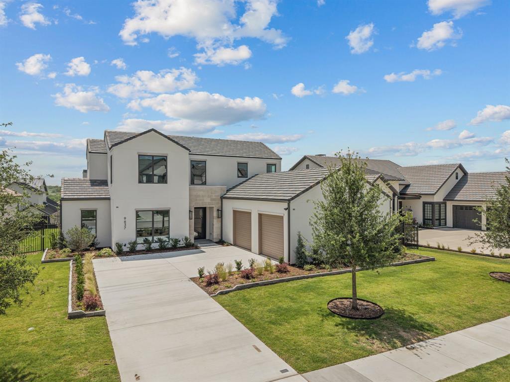 Welcome to 9637 Saint Michel, a recently completed home by Olerio Homes in the gated community of Montrachet. Offering 4 bedrooms and 4.5 baths, the layout is thoughtfully designed with clean lines, high ceilings, and abundant natural light throughout the main living spaces.

The kitchen is well-executed with quality cabinetry, a large island, and generous storage, opening seamlessly to the living and dining areas for easy everyday living and entertaining. The first-floor primary suite provides a private retreat with a spacious bath and closet, while the additional bedrooms offer flexibility for guests, work, or family.

The low-maintenance yard is ideal for a lock-and-leave lifestyle without sacrificing outdoor space. Located in Montrachet, residents enjoy a guarded entrance, resort-style pool, clubhouse, fitness center, and scenic trails—all just minutes from Fort Worth.