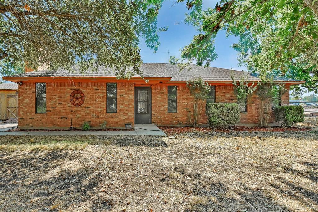 charming 3-bedroom brick home on 1-acre. This delightful property boasts a large open floor plan, perfect for comfortable living and entertaining. Situated just west of Van Alstyne, this home offers a serene setting while still being conveniently close to FM 121. The spacious living area provides a warm and inviting atmosphere, complete with a cozy fireplace to gather around and create lasting memories. The kitchen features modern appliances and ample counter space, making meal preparation a breeze. The primary bedroom includes a large closet, ensuring plenty of storage space. The property also offers a generous treed1-acre lot, providing ample room for outdoor activities and relaxation. Located in the sought-after Van Alstyne ISD. Don't miss out on the opportunity to make this lovely property your new home. Schedule a showing today!
