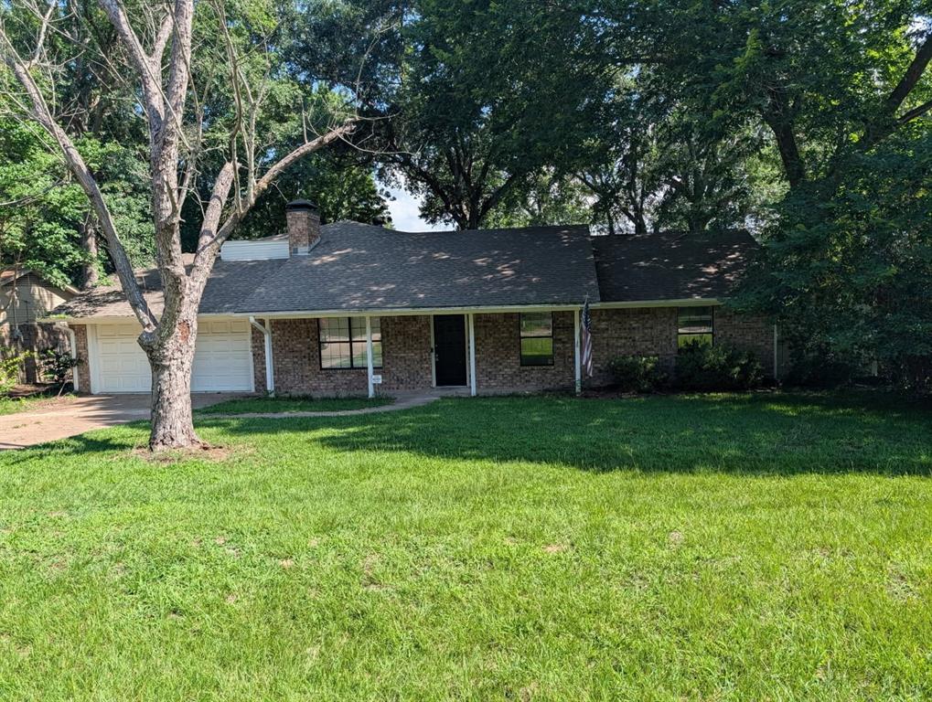Great size home located in the Flint area! This home has 4 bedrooms, 2.5 baths, approx. 2198 square feet, oversized family room with vaulted ceilings, separate built-in's and wood burning fireplace, and vinyl floors. Kitchen offers drop-in range-oven -electric, dishwasher, abundance of countertops and cabinets, kitchen-eating combo & breakfast bar. Large primary bedroom with full bath. 2nd and 3rd bedrooms are a good size. Private 4th bedroom upstairs with half bath. Utility room has overhead cabinets for storage and additional space in the sunroom room can be used as game room or 2nd living area or storage room-workout room. Large back yard has open patio to entertain and privacy fence. Schedule a showing today!