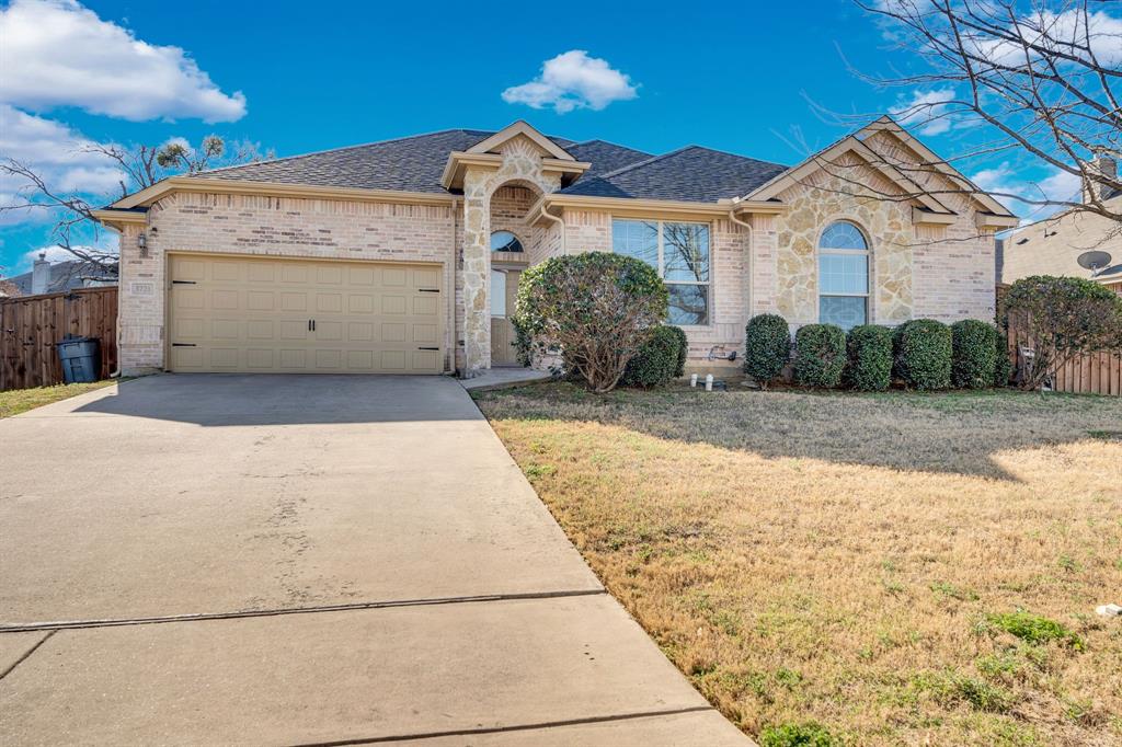 RARE FINANCIAL OPPORTUNITY: 3.875 PERCENT ASSUMABLE FIXED RATE LOAN AVAILABLE! Say hello to incredible monthly savings with this pristine, one-owner single-story home in the heart of Forest Hill, TX. Boasting approximately 2,091 square feet of functional, open-concept living space, this 4-bedroom, 2-bathroom gem perfectly blends modern style with commuter convenience to the Fort Worth Metroplex.

From the striking brick and stone curb appeal to the soaring high ceilings and durable wood-look tile flooring, every detail shines. The heart of the home features a spacious living room anchored by a cozy fireplace and elegant arched architectural details. Fire up your inner chef in the gourmet kitchen, complete with premium granite countertops, a center island, a timeless tile backsplash, sleek black appliances, and a massive amount of cabinet storage that flows effortlessly into the dining and main living areas.

Retreat to the private primary suite, offering a generous layout, dual vanities, a deep soaking tub, a separate shower, and a large walk-in closet. Three additional versatile bedrooms provide the perfect setup for a dedicated home office, gaming room, or guest space.

Step outside to your own private oasis featuring an oversized backyard with a covered patio, perfect for weekend BBQs and outdoor entertainment. Complete with an attached 2-car garage and an unbeatable location just minutes from Downtown Fort Worth, premier shopping, dining, and major DFW highways including I-20 and I-35W.

Assumable loan is subject to lender approval, buyer qualification, and verification of terms. Information deemed reliable but not guaranteed. Buyer and buyer’s agent to verify all information, including schools, square footage, measurements, taxes, restrictions, loan assumption terms, and all property details.