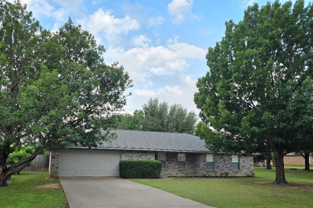 Enjoy a 4-bedroom, 3-bath home at an affordable price, not far from the front gate of the gated community of Decordova Bend Estates. A sensible, open floor plan with little wasted space awaits, with one of the bathrooms and bedrooms added in 2014. Pick your own peaches in this gardener's delight, with backyard raised beds, improved soil, and drip irrigation. Cobalt Saint Augustine sod was recently planted in a shaded area outside the back porch, and it's doing quite well. This house appraised at $345k in 2024, but has had over $15k in improvements and labor since then, including upgrades in the kitchen and bathrooms, plus a new (February 2026) water heater. The location is a short drive to numerous club amenities - golf, tennis, pickleball, a community pool, clubhouse, gym, marina, and beach volleyball. Mission Circle is a quiet street with a low volume of traffic - perfect for evening strolls. House owned by original owners. Don't miss this unique opportunity!