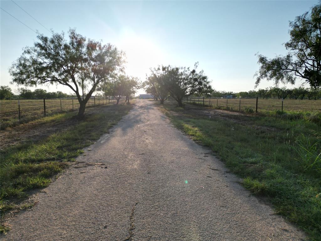 4.209 Acres in Potosi – Wylie ISD – Ready to Build! Discover the perfect homesite on this 4.209-acre tract located in the desirable Potosi area, within the sought-after Wylie ISD. This beautiful property offers a peaceful, rural setting just outside the city limits—no city taxes! 
Fully fenced with quality goat fencing and cross-fenced for horses or other livestock, this property is ideal for animal lovers or hobby farmers. A well-equipped barn with electric and water is already in place, adding immediate value and convenience. The land features a great mix of clay and sandy loam soil, providing excellent footing and drainage for animals and a solid foundation for building. 
The property has light restrictions to protect your investment, including:

No mobile homes

Minimum 1,500 sq. ft. site-built homes only (barndominiums welcome!)

Minimal restrictions designed to ensure structural integrity, visual appeal, and quality land use

Whether you're looking to build your dream home, bring your animals, or simply enjoy wide-open Texas skies, this property is a fantastic opportunity with the space and freedom you’ve been looking for.  Additional acreage available, call for aerial map.
