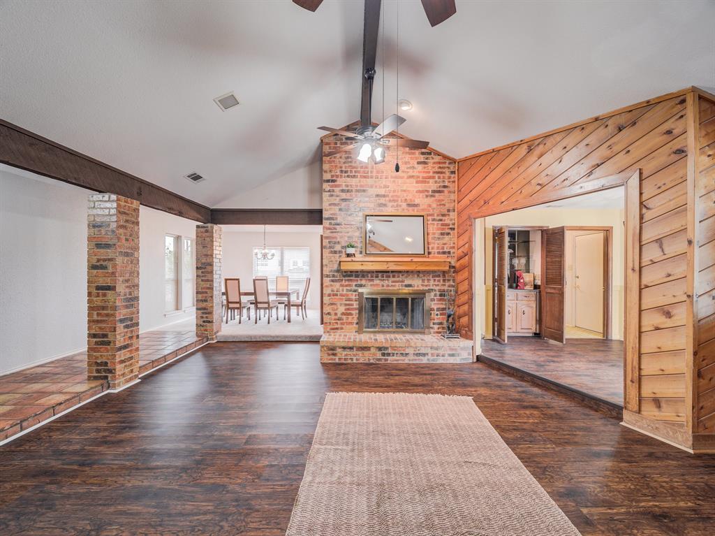 This stunning home is the perfect choice for first-time home buyers looking for their ideal space. 4 bedrooms and 2 bathrooms, this spacious home is filled with desirable features that will make you fall in love. Step inside and be captivated by the open and airy feel of the vaulted ceilings, creating an inviting and comfortable atmosphere. The master suite boasts a luxurious jacuzzi, providing a private sanctuary for relaxation after a long day. The built-in wardrobes and double closet provide ample storage space, keeping everything organized and within reach. The large secondary bedrooms offer plenty of room for family and guests. The bricked fireplace in the living room adds warmth and charm, creating the perfect ambiance for cozy evenings with loved ones. One of the highlights of this property is the large yard, providing endless possibilities for outdoor activities and entertaining. The corner lot location offers privacy and space, giving you the freedom to create your own oasis.