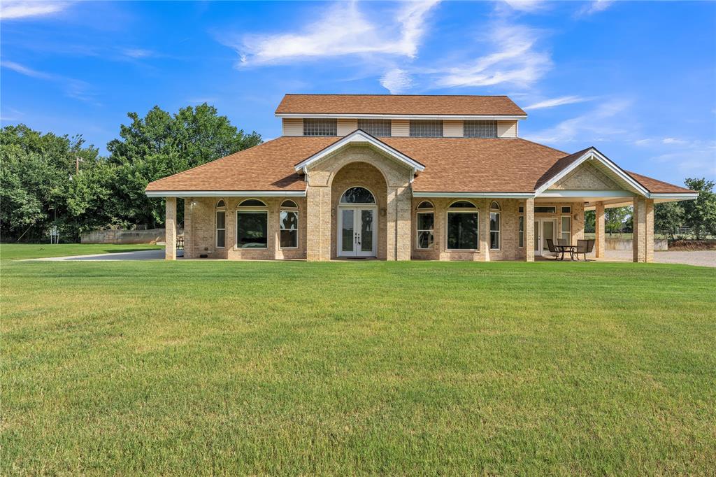Discover this one of a kind 3-bedroom, 3 bath 2 car garage home nestled in a highly sought-after area of Burleson, offering space, comfort, and endless possibilities.  Situated on 2 beautiful acres, this property is perfect for both everyday living and entertaining. The expansive primary suite is a true retreat, featuring dual vanities, a large walk-in shower, and a relaxing soaking tub. The chef's kitchen is thoughtfully designed with double ovens, a warming drawer, two sinks for added convenience, and a spacious island complete with built-in bar stools. The main home showcases stunning cathedral ceilings and an open-concept layout that creates a bright, airy feel throughout. The dining room is highlighted by a unique wall mural, while the living room offers a cozy propane gas fireplace-perfect for gatherings and relaxing evenings.  Step outside to find an impressive 800 plus sq ft shop that includes a separate apartment, ideal for guest, a home office or potential rental income. Seller is brother of selling agent.  Buyer and buyer's agent verify sq ft, schools, information in the listing.