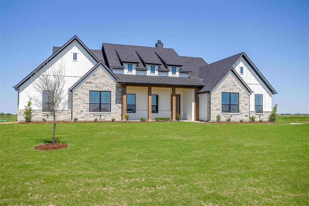20k YOUR WAY INCENTIVE! towards fencing and appliances IF CONTRACTED IN MAY WITH A JUNE CLOSING DATE!  Welcome to this stunning new build Elmwood home featuring the sought-after Luke floor plan. This thoughtfully designed home boasts an impressive chef's kitchen with a propane cooktop, double oven, and a large pantry, all highlighted by gorgeous quartz countertops, upgraded cabinetry, and stylish tile backsplash. The spacious vaulted family room creates a bright and airy atmosphere, complete with a cozy wood-burning fireplace, making it the perfect spot for family gatherings or quiet evenings in. With high-end finishes throughout, including upgraded countertops and cabinetry, this home combines elegance with functionality. The luxurious master suite offers a private retreat, complete with his and hers walk-in closets for ample storage. Enjoy modern conveniences with a tankless water heater, ensuring endless hot water, as well as a video doorbell and pre-wired camera system for added security. Every detail has been carefully crafted with quality and style in mind, from the upgraded finishes to the thoughtfully designed spaces. This home offers the perfect blend of comfort, functionality, and luxury—don't miss the opportunity to make it yours!