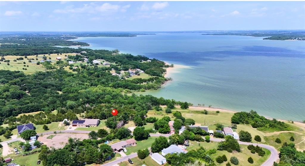 Here is your chance to own a beautiful LOT by the Lake! With Corp of Engineer property behind you, no one will be blocking your view! Build your dream Lake Home, Cottage or Tiny Home to get away for the weekend or live full time, just outside city limits on Lake Lavon! A peaceful neighborhood to spend time with the family or fish all day. Princeton has just been named one of the fastest growing cities, so get it while you can! Information deemed reliable, buyers agent to verify all information including but not limited to tax info, zoning, restrictions and especially schools. Schools are rapidly being built in this area so school zoning is subject to change.