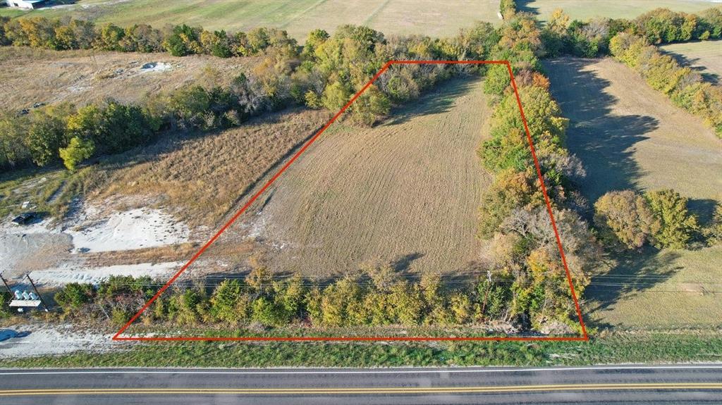 Located in Van Alstyne ISD!  Escape the craziness of the city to this great to a lot located in VAN ALSTYNE ISD.  this exceptional piece of property is a perfect location to build your dream home with prime road frontage and plenty of trees for privacy.  This property would be perfect for your custom home, luxury barndominium, or your family retreat!
