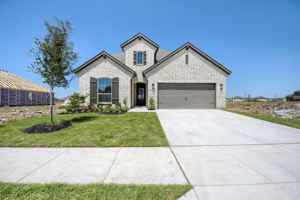 This charming home, located in the Wellington subdivision, sits on a gorgeous home site! The two-story home features four spacious bedrooms and three bathrooms. The primary suite has dual vanities, a drop-in soaker tub and generous walk-in closet. The open floor plan seamlessly connects to the family room and the kitchen and dining area. This creates an ideal space for entertaining and family gatherings. The family room opens to the back patio area which is perfect for grilling and outdoor living. This open concept lends itself to an indoor-outdoor living space especially good for entertaining. Additional highlights include an upgraded kitchen, hardwood flooring and a cozy fireplace. Upstairs the large game room invites gamers to join together for fun times. The four bedrooms and three bathrooms accommodate larger families and special guests. Residents of the Wellington subdivision enjoy access to two pools, walking trails, parks, playgrounds and pavilions with grilling areas. The location is convenient to DFW Airport, shopping, dining and highly rated Northwest ISD schools. This home truly combines comfort, convenience and enjoyment and is now complete and ready to tour!