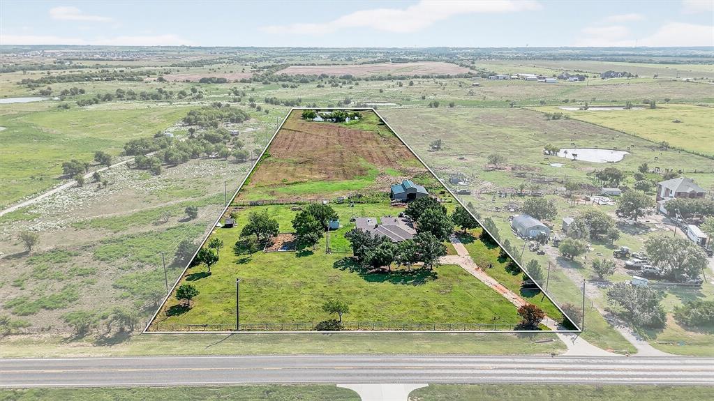Seize the opportunity to own 10 acres in one of the most sought-after growth corridors in North Texas. Ideally positioned just one mile from the future North Dallas Tollway and situated along the planned Legacy Dr, this property offers unmatched visibility and accessibility for future development. With nearly 300 feet of frontage along FM 455, the site is perfectly suited for a wide range of commercial or residential uses.
Key Advantages: Strategic Location – Adjacent to major planned infrastructure, including Legacy Road and the future extension of the Dallas North Tollway. Strong Growth Market – Celina continues to rank as one of the fastest-growing cities in Texas, driven by rapid residential and commercial expansion. Development Flexibility – Located within Celina’s Extraterritorial Jurisdiction (ETJ), providing greater options for future development compared to city-limited zoning. High Visibility – Nearly 300 feet of road frontage on FM 455 ensures strong traffic exposure for future businesses.
Investment Value – Current improvements include a home, being sold as-is. The true value lies in the land and its long-term development potential.
This property represents a rare chance to acquire land in the direct path of growth, offering investors and developers the ability to shape a prime piece of real estate in a booming corridor. Whether your vision is retail, mixed-use, residential, or a long-term hold, this tract is positioned to deliver exceptional returns. Schedule a showing today to secure your place in the future of Celina’s dynamic expansion.