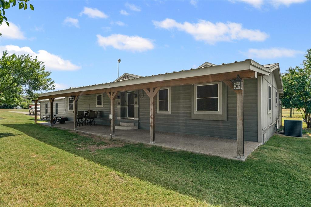 Awesome horse property in Wise County with multiple structures and possibilities. The main house has many upgrades and is not a traditional mobile home. The house has upgraded Hardie Board plank siding, a bonus media room with bar in the back connected to the large back porch. A great place to watch a game on the weekends. The house has an open concept with large nice kitchen with newer appliances, granite counters, and added on storage room. The closet space was remodeled and converted into a large walk in. 

Includes a 2nd mobile home on property that can be rented as well as a 574 sq ft bunk house built in 2008 with bathroom, kitchen on a 2 acre private lake with 880 sq ft of deck. A true fisherman's paradise. The lake has its own well and was stocked with catfish, crappie, and minnows. Great property to entertain with a large fire pit, basketball court, and play house for the kids. This is the perfect property to enjoy the outdoors, tenant sees deer nearly daily roaming. Includes a large metal shop with tack room and easily could be converted into a 3 horse stable. Has a large fenced in area  for horses or other animals to graze with nice wooden fence fairly new. Also contains a RV or boat covered storage area. The back 2 acres of the property has been used in the past to grow coastal hay. A very unique well maintained property with country vibes yet not too far away from the Metroplex.