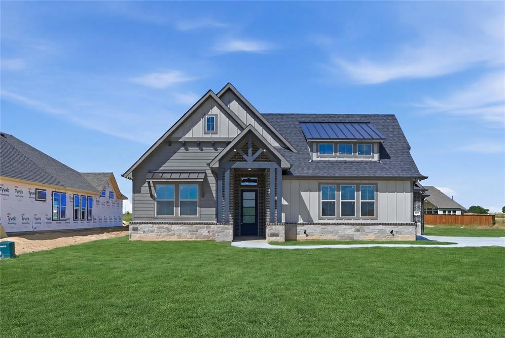 Just completed 06-11! Beautifully designed single-story home offering approximately 3,009 square feet of living space! The open concept kitchen, dining, and family room create an inviting central living area with vaulted ceilings and abundant natural light. The kitchen features a large island, walk-in pantry, and convenient access to the dining area, making it ideal for everyday living and entertaining. The private primary suite includes a spacious bedroom with vaulted ceiling and ensuite bath featuring dual vanities, separate tub and shower, and two walk-in closets. Secondary bedrooms are thoughtfully positioned to provide separation and flexibility. Additional features include a dedicated game-media room or office, powder bath for guests, centrally located utility room, and mudroom with convenient access from the garage. Outdoor living is enhanced by a covered patio that extends the entertaining space. The property includes a three car garage, providing flexibility for storage or additional parking. This well-designed plan offers a balance of open living areas and private spaces, making it suitable for a variety of living needs.