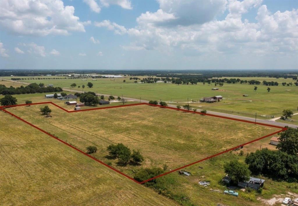 Opportunity awaits with this unrestricted acreage ideally located just off Highway 377! Spanning 6.664 acres outside city limits, this versatile property offers the freedom to build your dream home, establish a business, or pursue future development. Previously used for agricultural purposes, the land has a proven history of producing rich hay bales, reflecting its fertile ground and potential.
Boasting approximately 535 feet of Highway 377 frontage, the property provides excellent visibility and easy access—making it well-suited for commercial or mixed-use possibilities. Whether you’re seeking open space, investment potential, or a prime location with flexibility, this property truly offers the best of both worlds.
Don’t miss your chance to turn this exceptional land into your next vision.