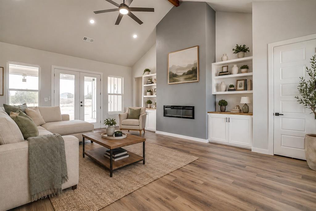 Bring your best offer and welcome to your new home! This stunning 4-bedroom 3.5 bath home offers a modern farmhouse design on a spacious 1.6 acre lot. No HOA! Step inside to an inviting open concept with high ceilings, abundant natural light and storage space galore. Enjoy the generous walk-in pantry and beautifully designed butler's pantry complete with a built-in beverage fridge. The kitchen offers sleek quartz countertops and matching GE appliances, including a fridge! Retreat to your primary bedroom to relax in front of your private fireplace and enjoy the spacious ensuite bathroom and closet of your dreams. Designed for indoor outdoor living, the back patio is plumbed for a future outdoor kitchen or bar and backyard is clear for a pool, making it easy to create your dream entertaining space. Enjoy the peace of wide-open views while still being minutes from town. No climb fencing on 3 sides. Comes with a 1-2-10 home warranty. Buyer and Buyer Agent to verify all information in this listing. INFORMATION DEEMED RELIABLE BUT NOT GUARANTEED some photos have been edited to add furniture.