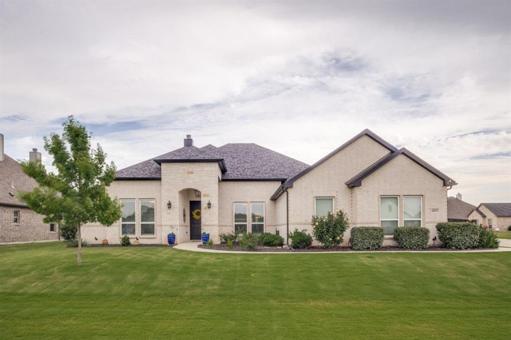 This customiized Kenmark home located on a half acre corner lot in the country close to the city is amazing. Enter this light and bright home to find formal dining or living to the right, vaulted ceilings, crown molding, shutters. Well designed single story floorplan featuring 4-5BR split 3 ways, with full bath in each wing, walk-in closets, extra storage. Spacious kitchen with large island & breakfast bar, walk-in pantry, informal dining overlooking backyard. Family room with wbfp & large windows overlooking the patio, pool, pergola, garden shed, vegetable garden, pecan trees and olive tree. Ample driveway parking to side-entry, spacious 3.5 car garage with dual doors featuring separate chain, MyQ openers, dual water heaters, reverse-osmosis water purifier and attic access. Lot of built-in storage in garage with room for extra appliances. Ceiling fans, radiant barrier, attic turbines, well insulated attic & dual-zoned HVAC for comfort & energy efficiency. Too many features to list here. Must see to appreciate.