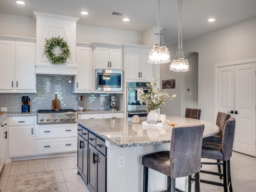 This immaculate home in Fairway Ranch is move-in ready and packed with upgrades, making it a true standout. Perfect for entertaining, both the home and backyard are designed to offer comfort and functionality. With summer approaching, the sparkling pool and spacious patio are ready to become your personal oasis, ideal for floating, relaxing, and enjoying warm days. This stunning single-story home boasts an open-concept design that seamlessly connects the kitchen, living, and dining areas, all enhanced by beautiful tile floors throughout. The kitchen is a chef’s dream, featuring a large center island, stainless steel appliances, a gas cooktop, double ovens, and a charming breakfast room nearby. The inviting living area includes a cozy corner gas fireplace and a wall of windows that frame picturesque views of the backyard and pool. Retreat to the luxurious master suite, complete with a spa-like bathroom offering dual sinks, a separate shower, a soaking tub, and a spacious walk-in closet. The thoughtful layout includes a three-way split bedroom arrangement, with a guest suite that offers its own private bath. Built in 2018, this exceptional 4-bedroom, 3.5-bath home also includes a dedicated office, a 3-car garage, and an impressive 2,856 square feet of living space—all conveniently located on one level!