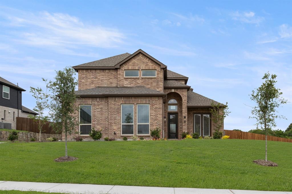 MLS# 21219276 - Built by First Texas Homes - Ready Now! ~ Discover this stunning new construction home offering 5 spacious bedrooms, including 2 conveniently located on the main floor, and 4 full bathrooms. With 2,728 sq ft of living space, this residence features a grand curved staircase, a dedicated study, a versatile game room, and a 3-car garage. The gourmet kitchen boasts a large California island, granite countertops, stainless steel appliances, a double oven, and a butler’s pantry. Enjoy outdoor living on the covered patio. Don’t miss your chance to make this exceptional property your new home!
