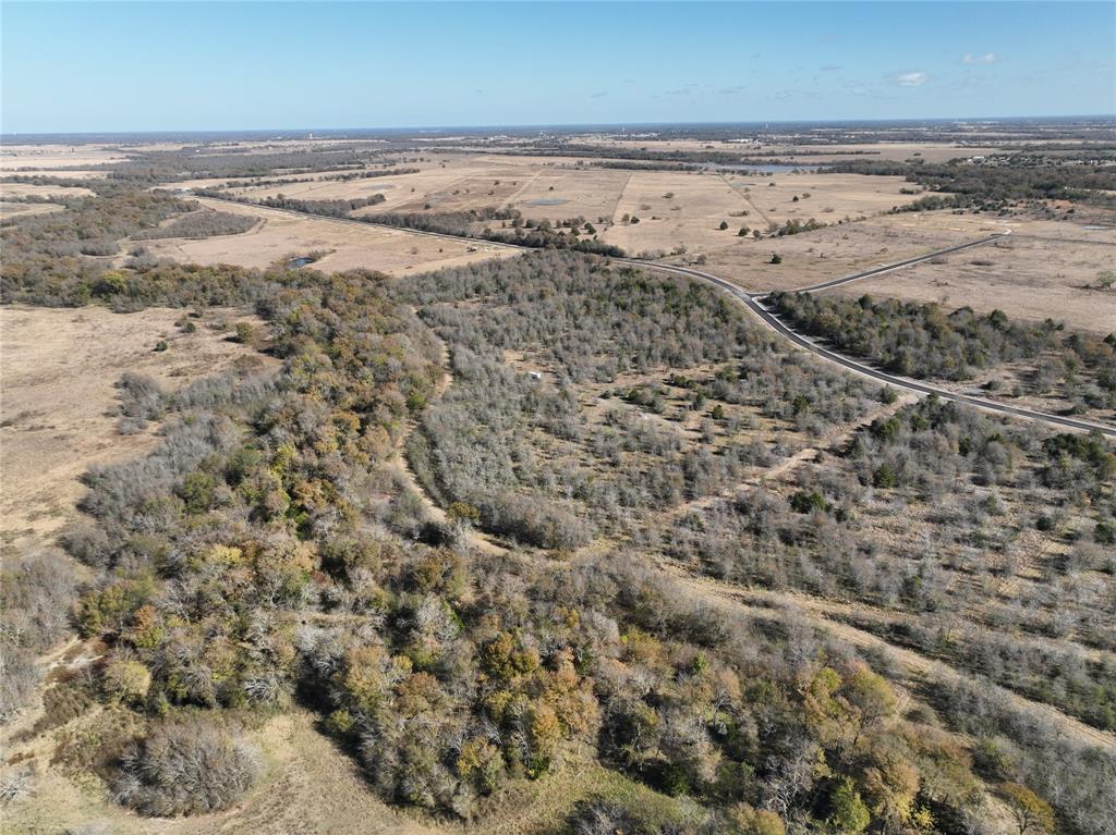 This is it, the piece of Texas paradise you've been waiting for. Enjoy over 8 peaceful acres with the perfect balance of privacy and convenience, just outside the DFW area. Located only 15-20 minutes from Lake Tawakoni and approximately 6 minutes from local shops, as well as nearby police and fire stations, this property offers both tranquility and accessibility. The lot backs to a large, serene creek, ideal for fishing, relaxing, or simply enjoying the surrounding natural beauty. Paved asphalt roads, a gated entrance, underground electric, water service, and AT&T fiber optic availability make this property ready for your vision. Whether you're planning to build your dream home or hold as a long-term investment, this land delivers exceptional flexibility. The property is Ag Exempt, keeping taxes low, and there are no restrictions on animals, building materials, or timeline to build. Only a limited number of tracts remain in this close-out phase, don't miss your chance to own a truly special piece of land.