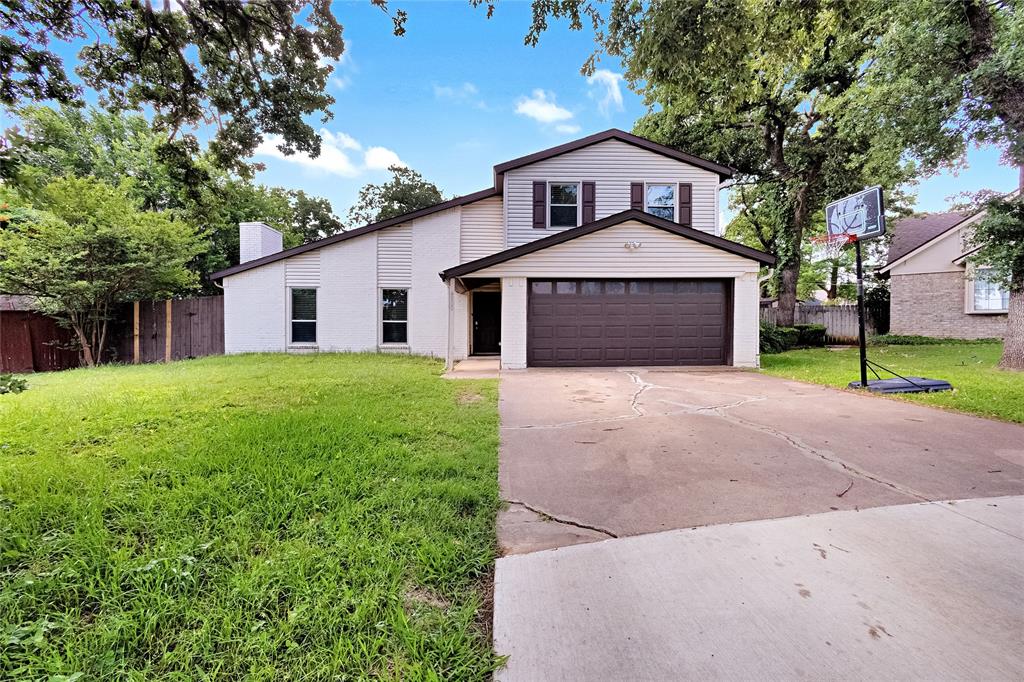 No HOA! Bright, open, and filled with natural light, this inviting 4 bedroom, 2 bath home in Arlington delivers the space and flexibility buyers are searching for. The oversized living room showcases soaring ceilings that extend to the upper level, creating an airy atmosphere that immediately makes the home feel expansive and welcoming. Designed for both entertaining and everyday living, the kitchen features a center island, breakfast bar, and open connection to the main living spaces, making gatherings feel effortless. The main level primary suite offers added privacy with its own ensuite bath, while the additional bedrooms provide room for guests, work-from-home setups, or hobbies on the upper level. Outside, the spacious fenced backyard offers endless possibilities for relaxing, entertaining, pets, or outdoor activities. Located near I-20 and TX Hwy-360, the home is close to major Arlington attractions including The Parks Mall at Arlington, shopping along South Cooper Street, local dining, parks, entertainment venues, and everyday conveniences throughout the DFW area. Discounted rate options and no lender fee future refinancing may be available for qualified buyers of this home.