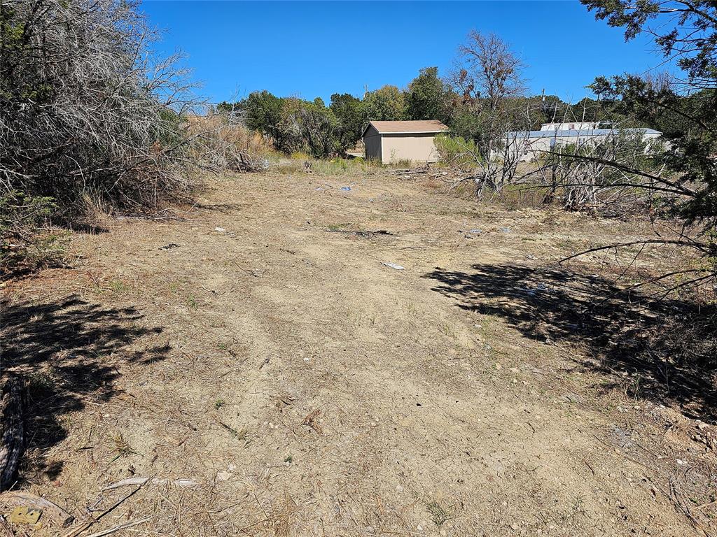 This 0.04 acre lot is located close to the shopping and entertainment of downtown Granbury. In an HOA and out of the city limits, makes this a perfect place to build that perfect home or rental investment that offers unique potential. This lot is mostly cleared. Also enjoy the community dock and boat ramp while catching that beautiful sunset over the water