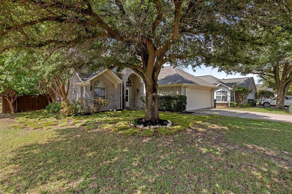 Large home with updates throughout.  Offers extras like window seats, French doors in the formal dining area, vaulted ceilings, crown molding and more.  Eat in kitchen has breakfast bar and opens to the family room with fireplace, large downstairs master suite has garden tub, separate shower and separate vanities, game room has wet bar, fenced yard with sprinkler system and pergola with deck. New roof June 2026. New sod installed front yard June.  Close to everything!